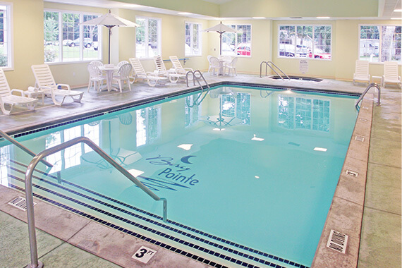 A swimming pool at a Shelbyville Hotel,  perfect for guests looking for things to do during their vacation in West Michigan to stay active. 